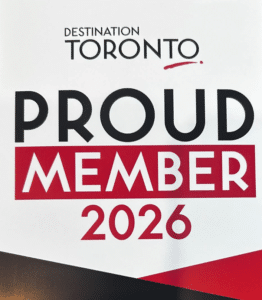 Luxury private chauffeur service VVIP Toronto Limo corporate badge showcasing proud membership with Destination Toronto for 2026.