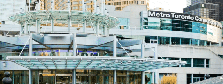 Inside a luxury VVIP Toronto limo with a view of the Metro Toronto Convention Centre MTCC South Building and downtown Toronto skyline.