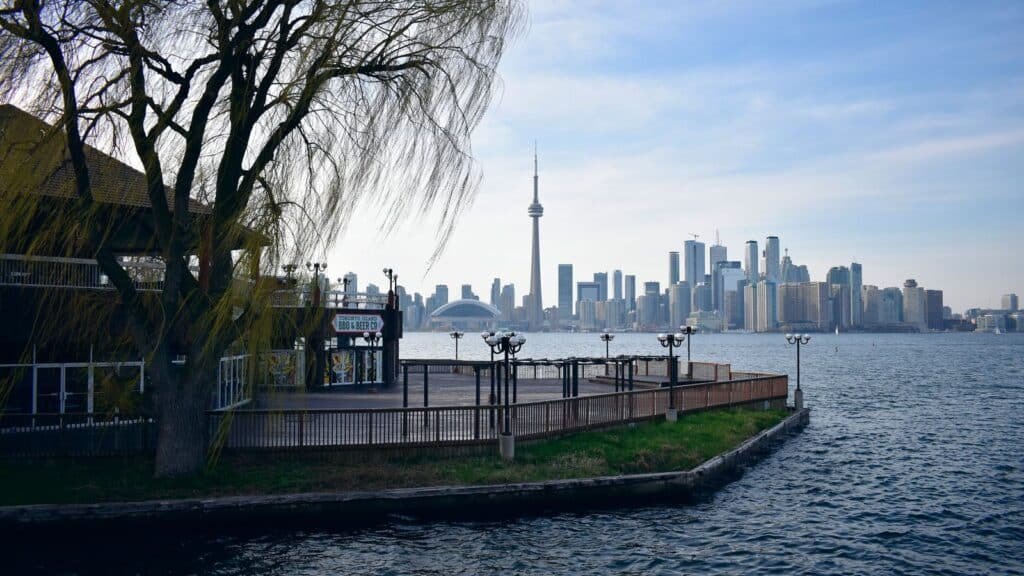 Toronto skyline and CN Tower seen from Toronto Island across the harbour